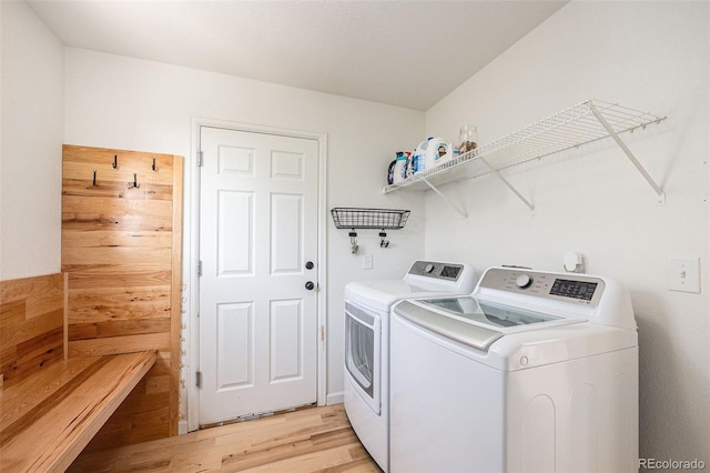 6833 E 115th Ave, Thornton, CO 80233 - laundry area with washer and dryer and light wood-style floors