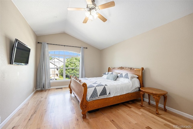 6833 E 115th Ave, Thornton, CO 80233 - bedroom featuring vaulted ceiling, light wood finished floors, and ceiling fan