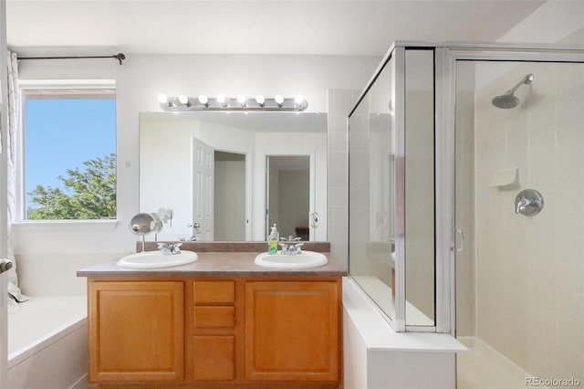 6833 E 115th Ave, Thornton, CO 80233 - full bathroom featuring a stall shower, a garden tub, and double vanity