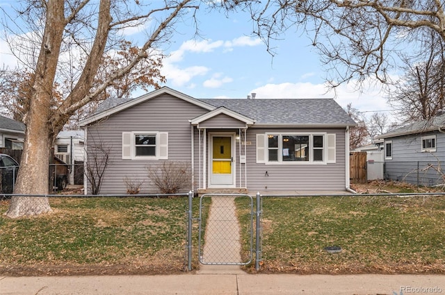 2248 Lima St, Aurora, CO 80010 - bungalow-style house with a gate and a shingled roof