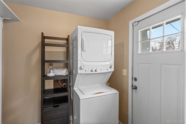 2248 Lima St, Aurora, CO 80010 - laundry area with stacked washer / drying machine and baseboards
