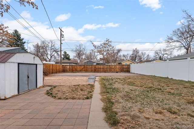 2248 Lima St, Aurora, CO 80010 - fenced backyard with a storage shed