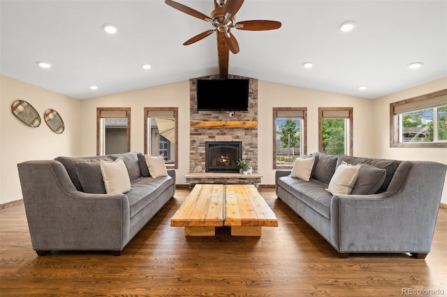 10380 W Warren Ave, Lakewood, CO 80227 - living room with dark wood-type flooring, ceiling fan, and a fireplace