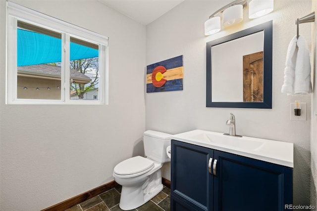 10380 W Warren Ave, Lakewood, CO 80227 - bathroom with vanity and stone finish flooring