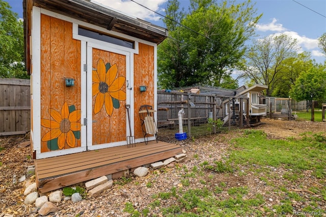 10380 W Warren Ave, Lakewood, CO 80227 - view of shed with a fenced backyard