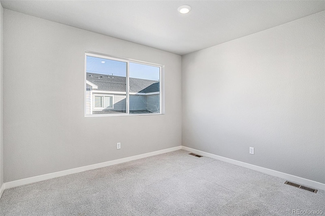 unfurnished room with carpet