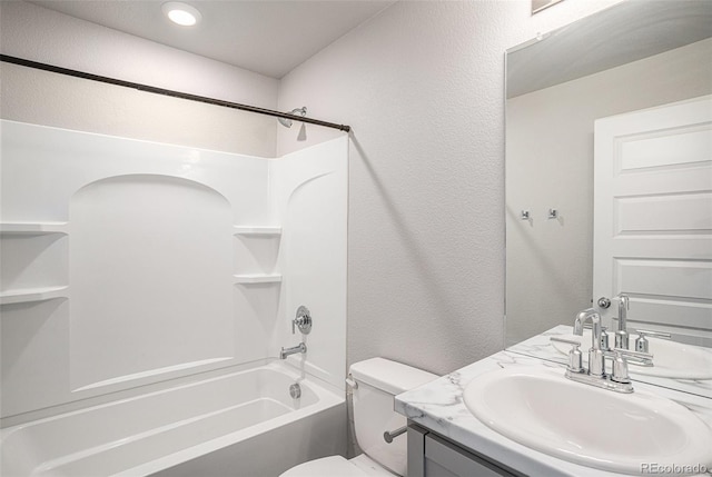 full bathroom featuring vanity, shower / bath combination, and toilet