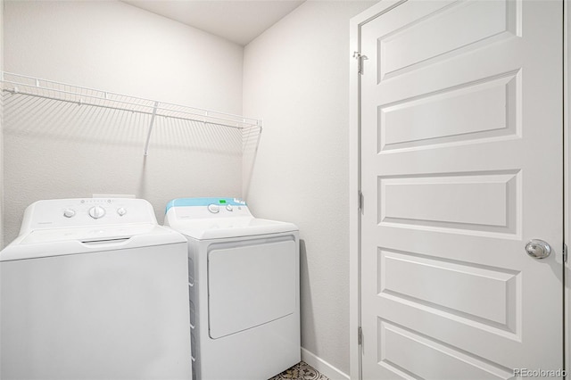 laundry area featuring independent washer and dryer