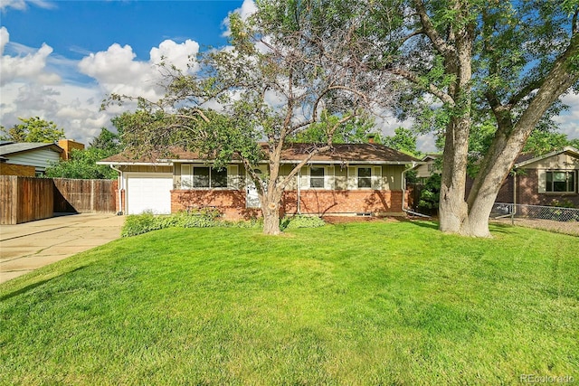 1030 Kohl St, Broomfield, CO 80020 - single story home featuring concrete driveway, an attached garage, and brick siding