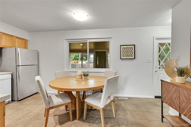 1030 Kohl St, Broomfield, CO 80020 - dining room featuring baseboards
