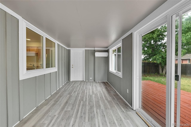 1030 Kohl St, Broomfield, CO 80020 - unfurnished sunroom with a wall unit AC and healthy amount of natural light