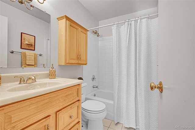 1030 Kohl St, Broomfield, CO 80020 - full bath featuring vanity, shower / tub combo, and tile patterned flooring
