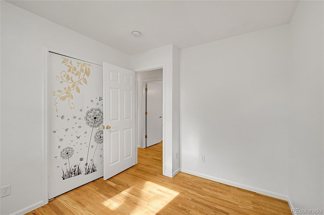 1030 Kohl St, Broomfield, CO 80020 - unfurnished bedroom with light wood finished floors and baseboards