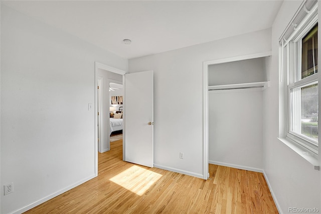 1030 Kohl St, Broomfield, CO 80020 - unfurnished bedroom with light wood finished floors and a closet