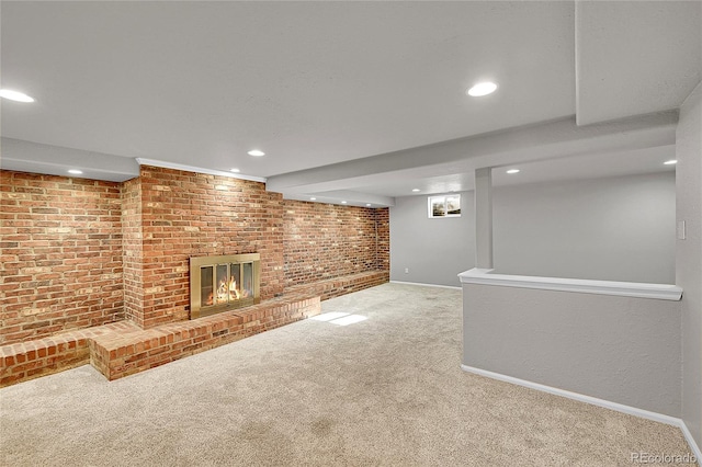1030 Kohl St, Broomfield, CO 80020 - finished basement featuring carpet, recessed lighting, a brick fireplace, and brick wall