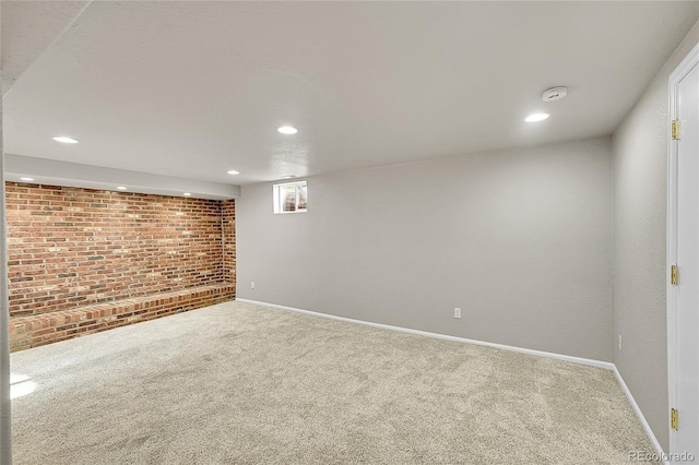 1030 Kohl St, Broomfield, CO 80020 - basement with carpet, brick wall, and recessed lighting