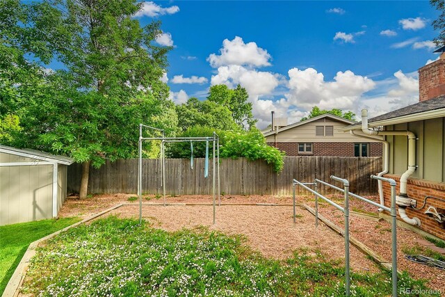 1030 Kohl St, Broomfield, CO 80020 - fenced backyard featuring a shed