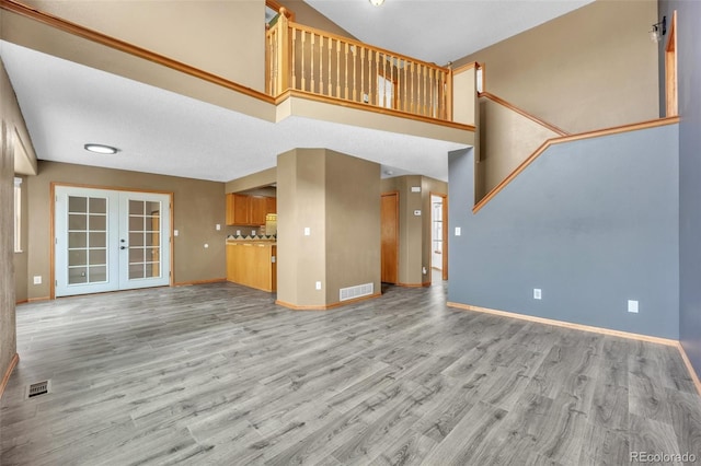 11640 Cranston Dr, Peyton, CO 80831 - unfurnished living room with baseboards, light wood-style floors, and visible vents