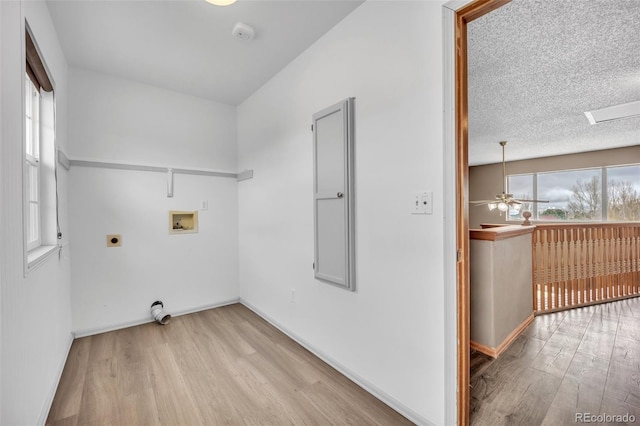 11640 Cranston Dr, Peyton, CO 80831 - laundry area featuring laundry area, electric dryer hookup, washer hookup, and wood finished floors