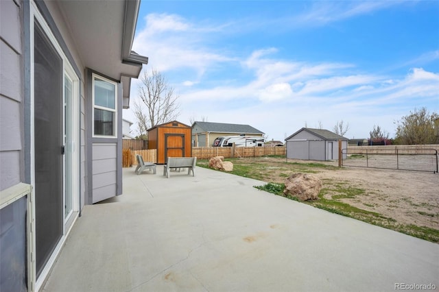 11640 Cranston Dr, Peyton, CO 80831 - view of patio / terrace featuring a fenced backyard, a storage shed, and an outdoor structure