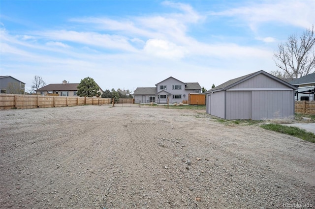 11640 Cranston Dr, Peyton, CO 80831 - view of yard featuring an outdoor structure and fence
