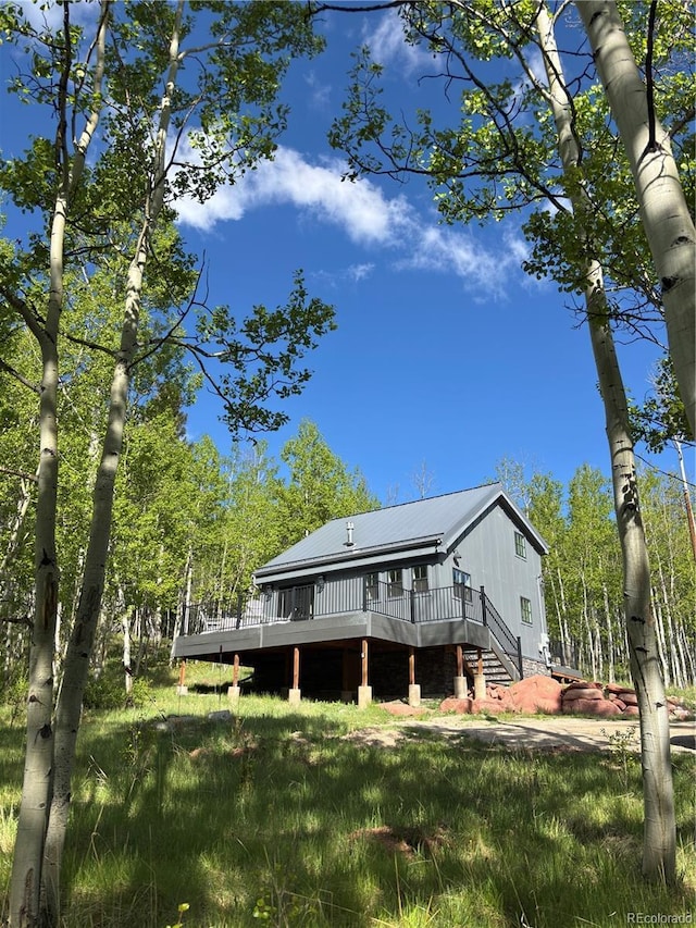 47 Lumberjack Rd, Fairplay, CO 80440 - back of house with a wooden deck and metal roof