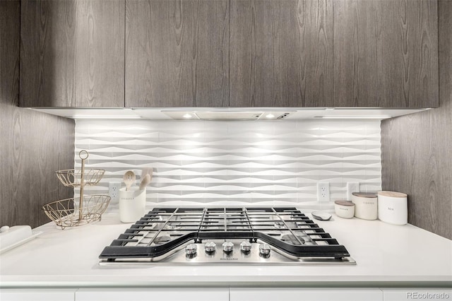 kitchen featuring stainless steel gas cooktop and backsplash