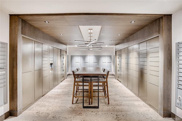 dining area featuring light hardwood / wood-style floors and a package area