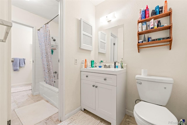 full bathroom featuring shower / bath combo, vanity, and toilet