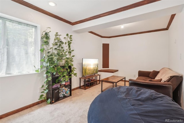 bedroom with crown molding, baseboards, and light colored carpet