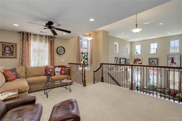 9546 Firenze Way, Highlands Ranch, CO 80126 - carpeted living area featuring a ceiling fan, recessed lighting, and baseboards