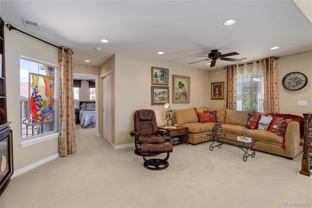 9546 Firenze Way, Highlands Ranch, CO 80126 - carpeted living area with recessed lighting, ceiling fan, and baseboards