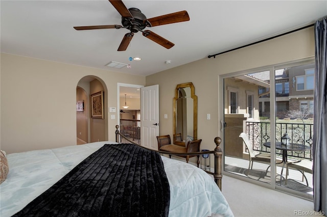 9546 Firenze Way, Highlands Ranch, CO 80126 - carpeted bedroom with access to outside, arched walkways, and a ceiling fan