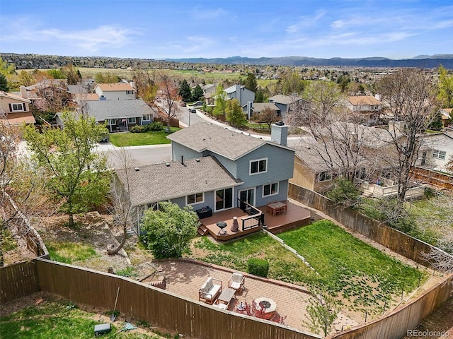 drone / aerial view featuring a mountain view and a residential view