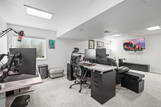 carpeted home office featuring baseboards and visible vents
