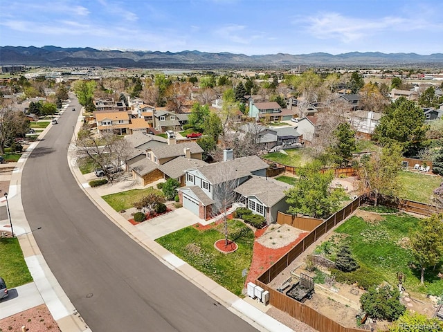 drone / aerial view featuring a mountain view and a residential view