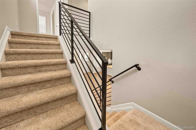 stairway with baseboards