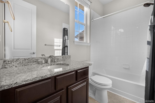 bathroom featuring toilet, shower / tub combo, vanity, and tile patterned floors