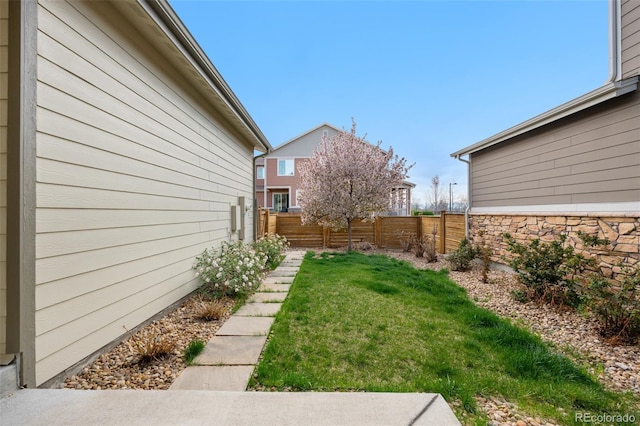 view of yard featuring fence