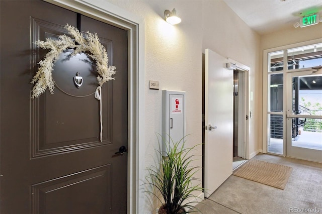 7240 W Custer Ave Unit 303, Lakewood, CO 80226 - entrance foyer featuring light carpet