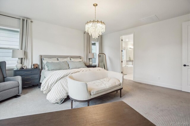14423 Shasta Daisy Ln, Parker, CO 80134 - bedroom featuring carpet flooring, a chandelier, and ensuite bath