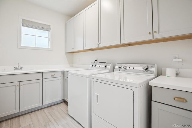 14423 Shasta Daisy Ln, Parker, CO 80134 - laundry area featuring cabinet space and separate washer and dryer