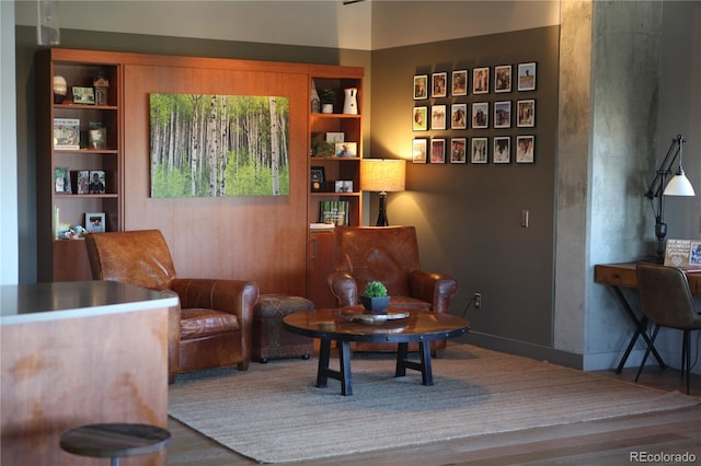 1925 W 32nd Ave Unit 404, Denver, CO 80211 - sitting room with built in features and wood finished floors