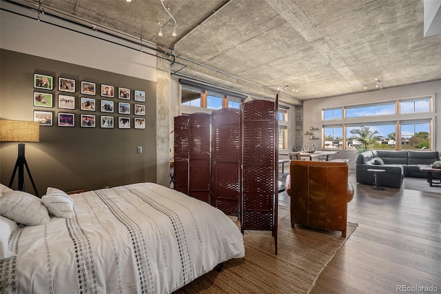 1925 W 32nd Ave Unit 404, Denver, CO 80211 - bedroom with hardwood / wood-style floors