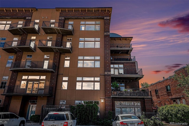 1925 W 32nd Ave Unit 404, Denver, CO 80211 - view of property at dusk