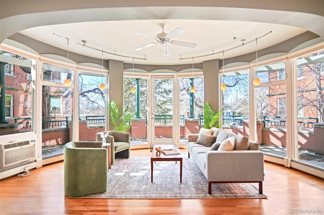 3249 W Fairview Pl Unit 106, Denver, CO 80211 - sunroom featuring rail lighting