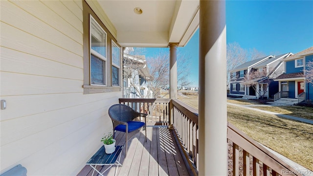 balcony featuring a residential view