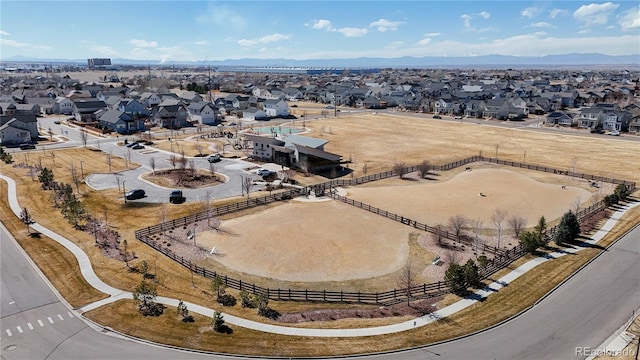 aerial view featuring a mountain view and a residential view