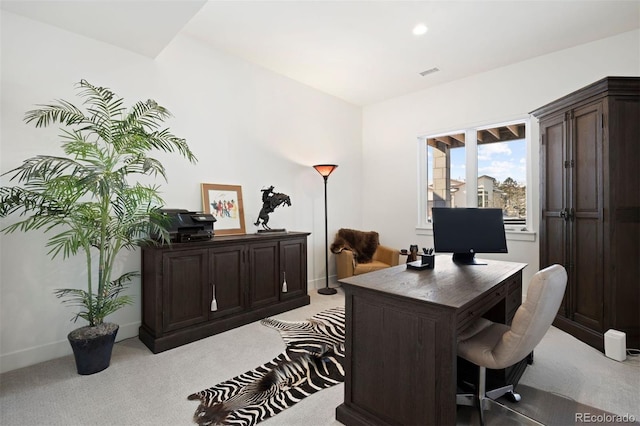 home office with light colored carpet