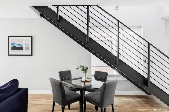 3156 W 20th Ave, Denver, CO 80211 - dining area featuring wood finished floors and stairs
